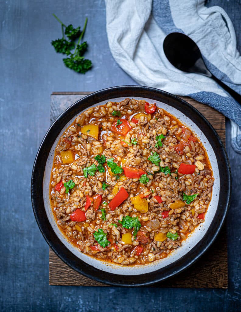 Photo of a bowl of deconstructed stuffed pepper with pearl barley