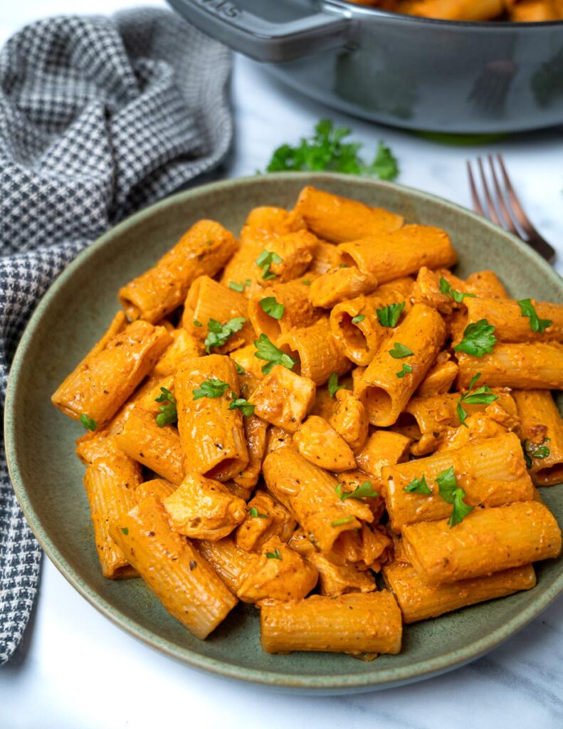 a plate of a spicy chicken pasta