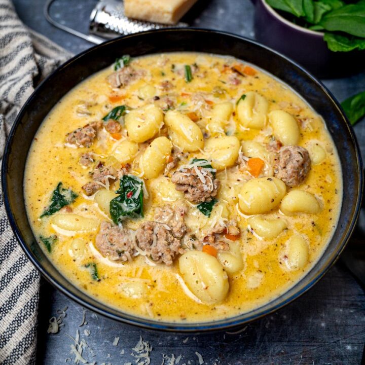 A bowl of creamy gnocchi soup with sausage