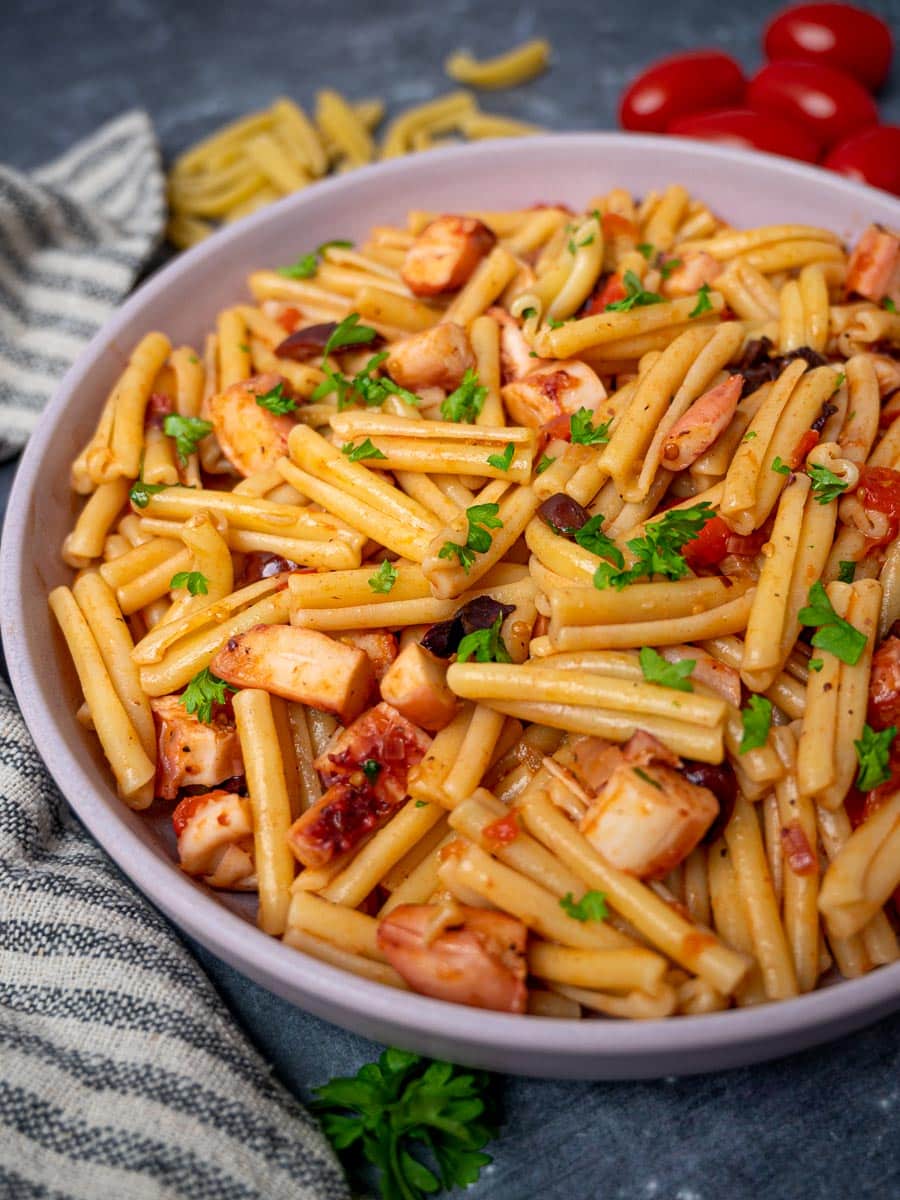 A bowl of pasta with seafood