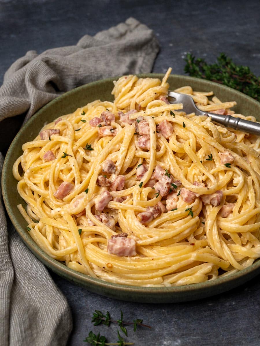 A plate of linguine with bacon