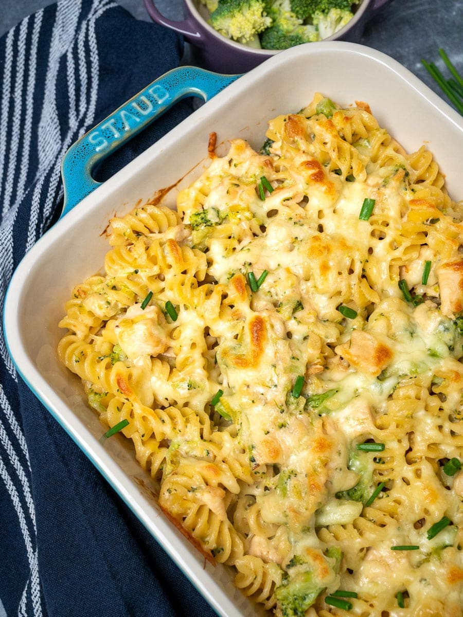 An oven tray with chicken and broccoli pasta
