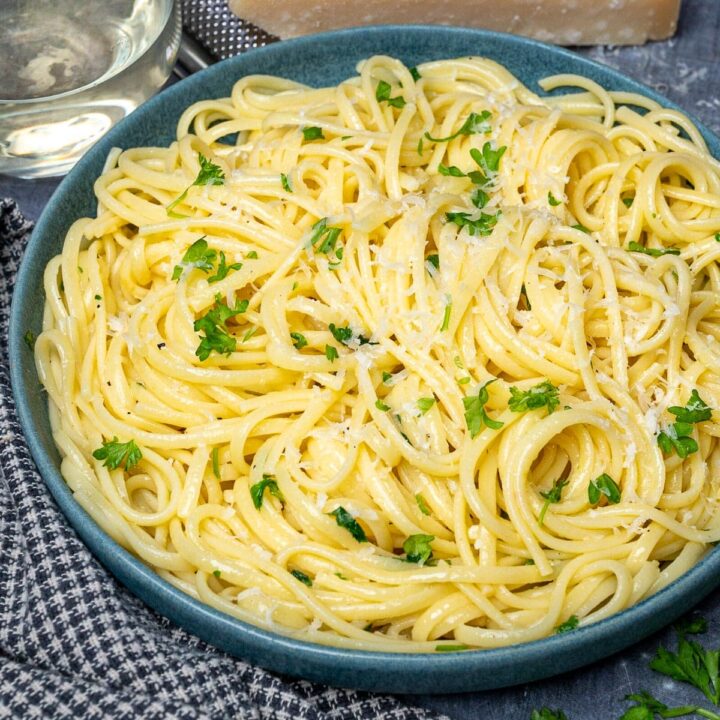 A bowl of pasta with white wine