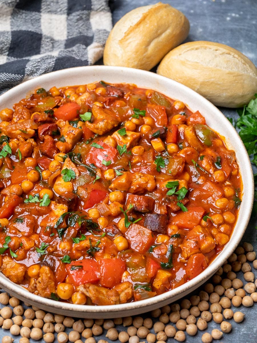 a plate of chicken and chorizo stew