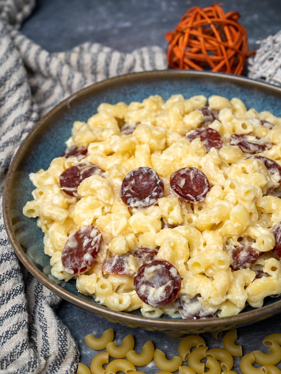a plate of kielbasa mac and cheese