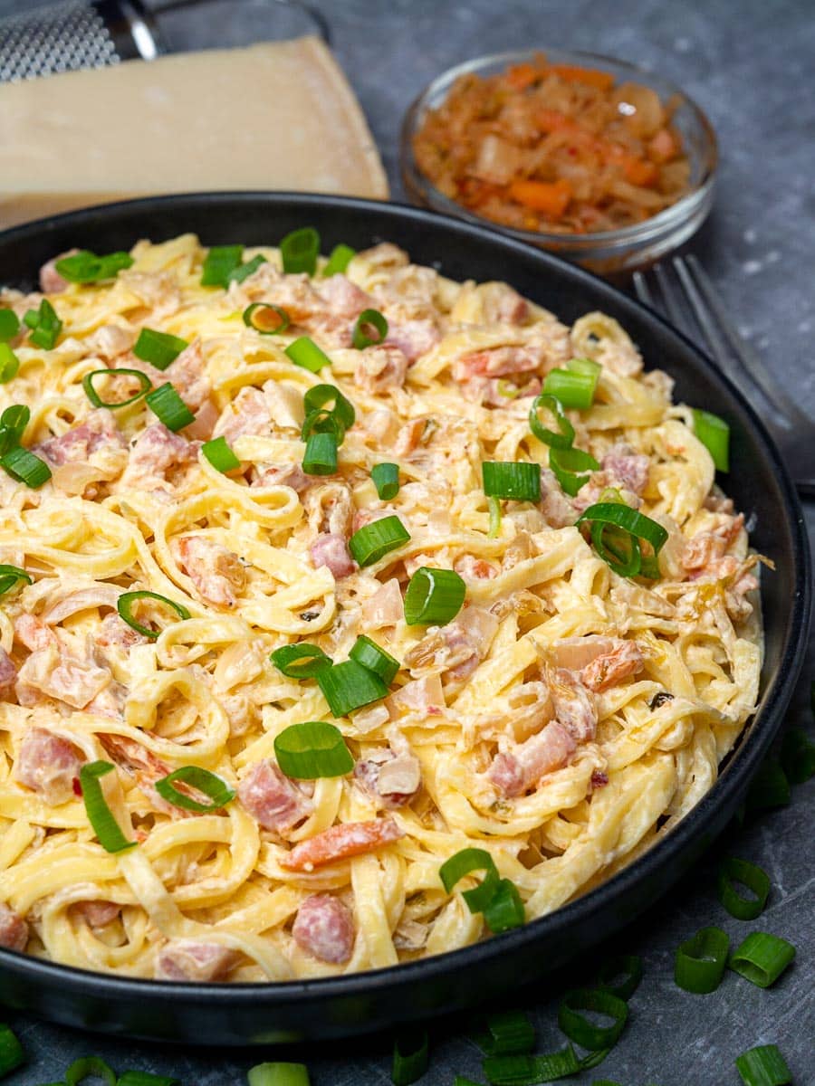 A bowl of pasta with Asian flavors and pancetta
