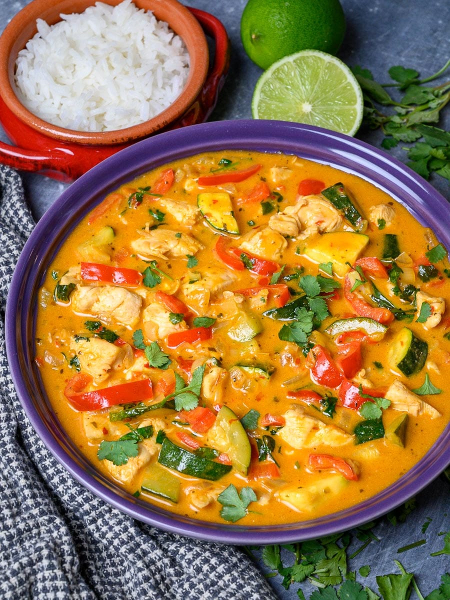 a plate of thai red curry chicken