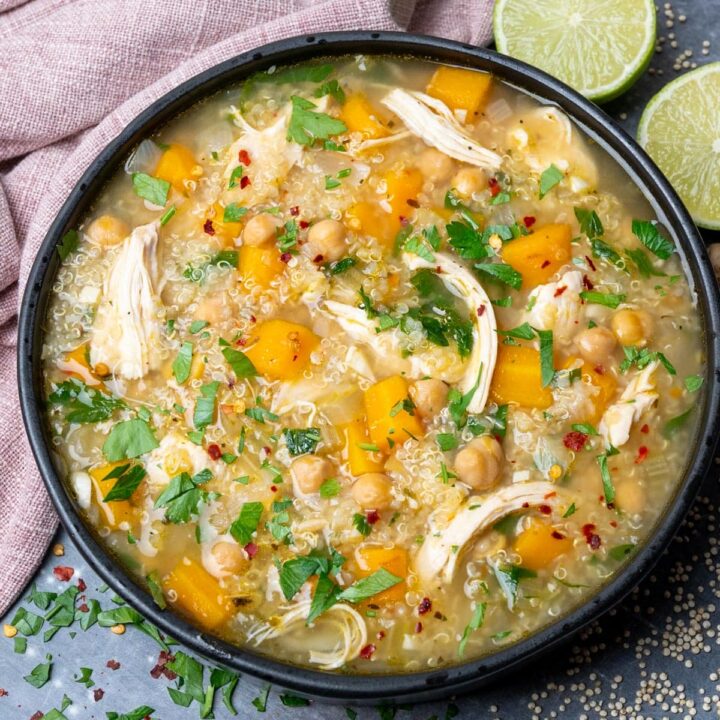 A bowl of chicken soup with quinoa and chickpeas