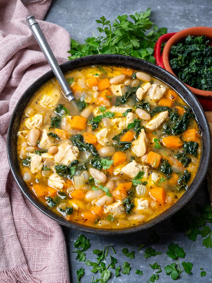 A bowl of chicken white bean soup.