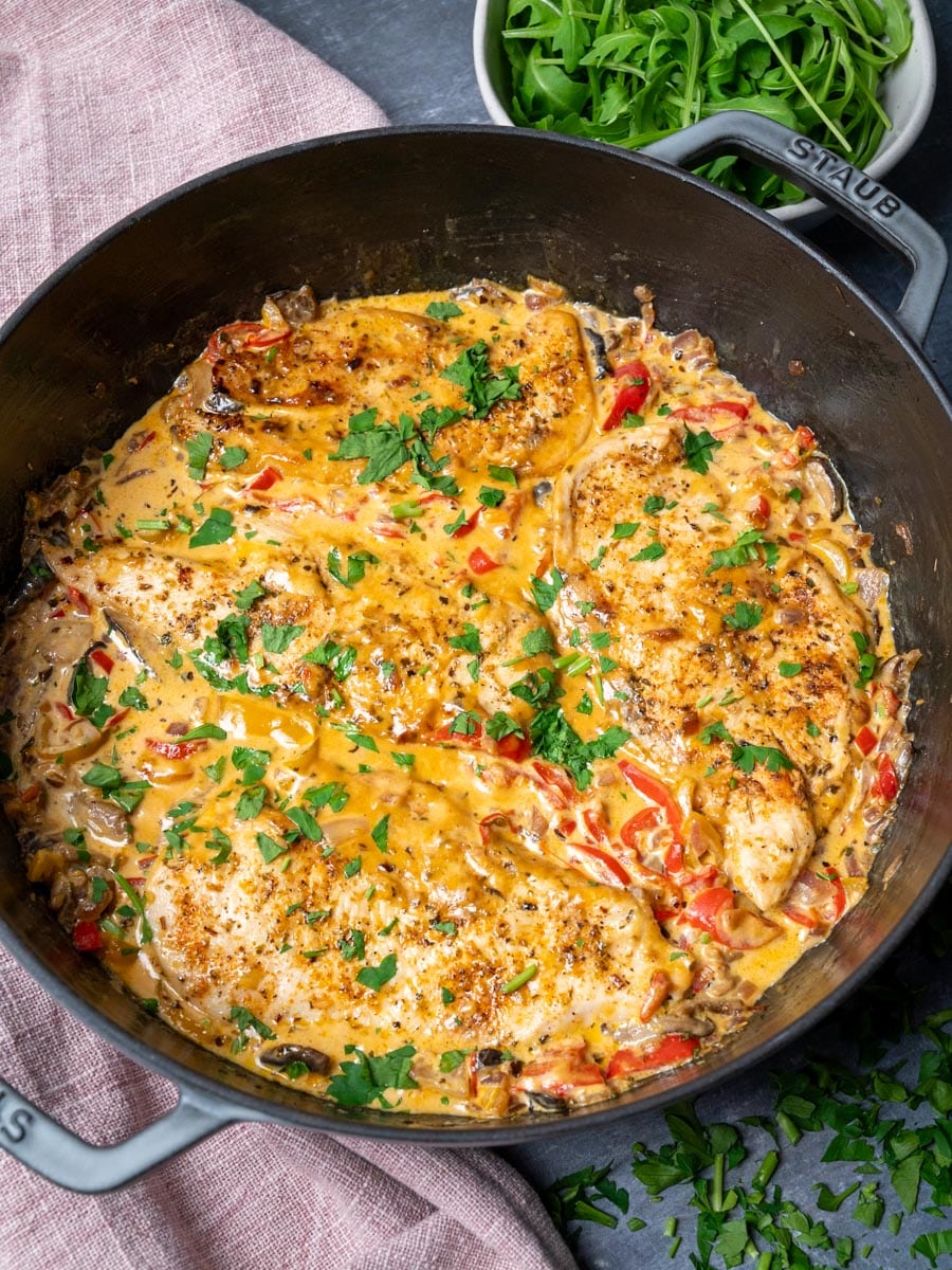 one pan dish with parsley on top