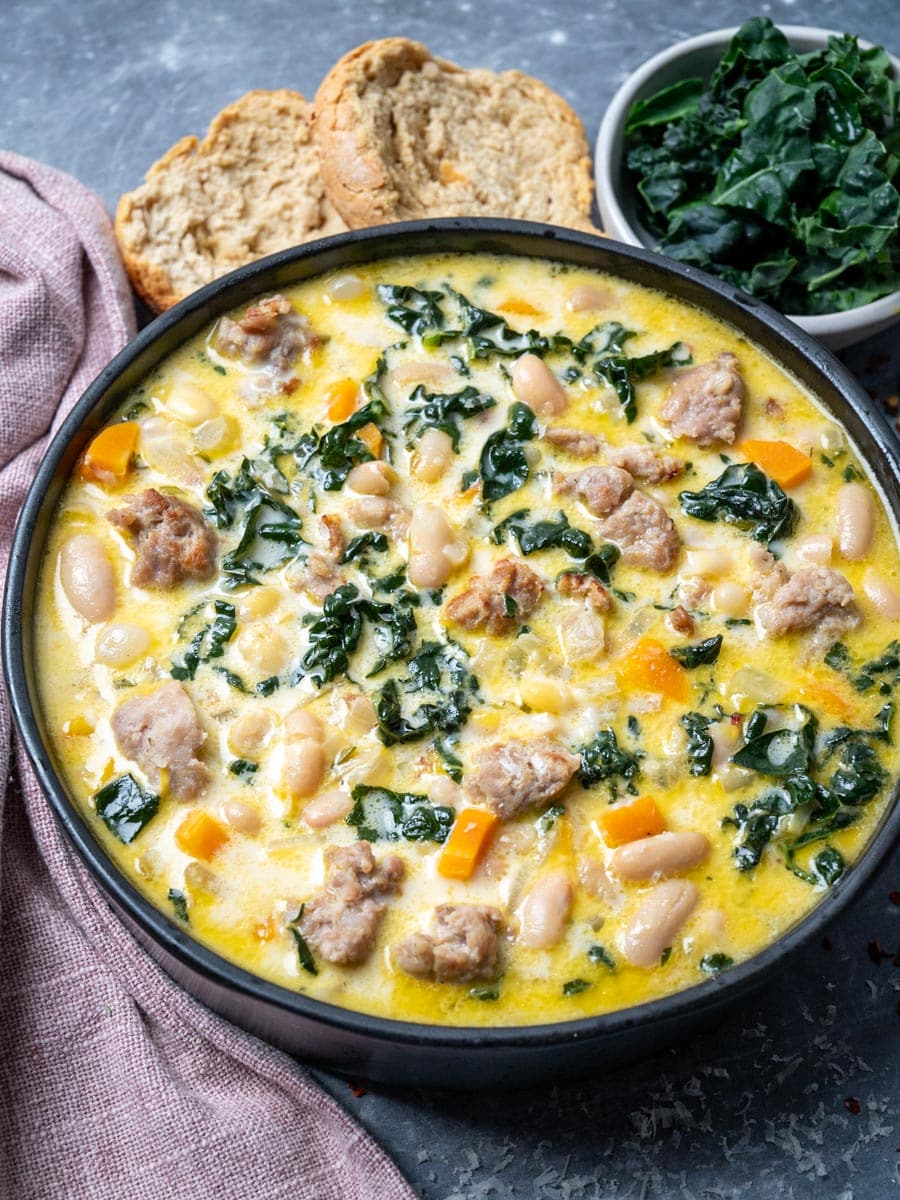 a bowl of Kale and White Bean Sausage Soup