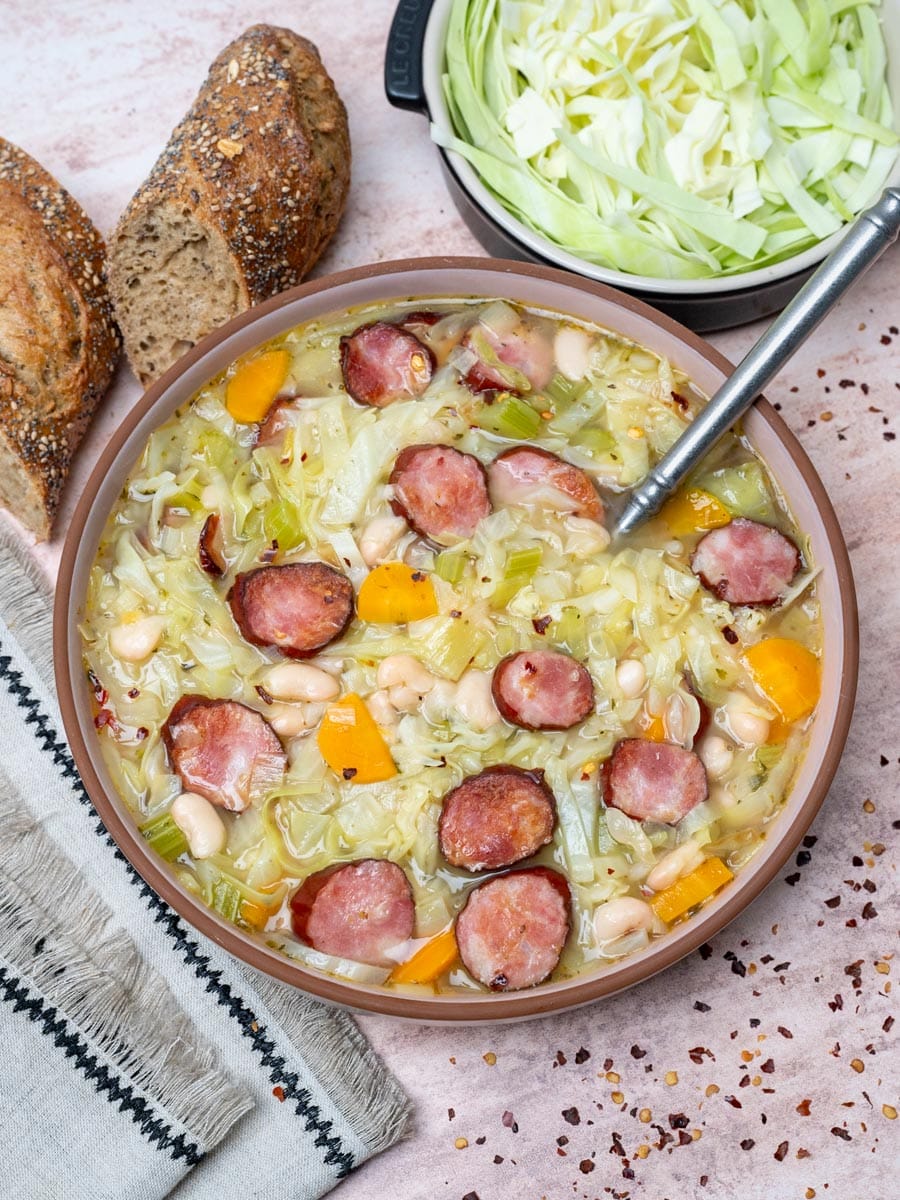 Cabbage Sausage Soup with bread on the side