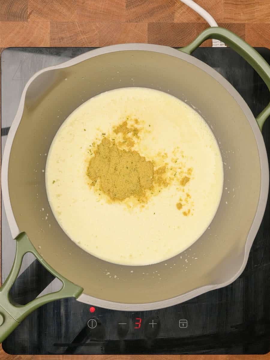 adding spices to an American dish