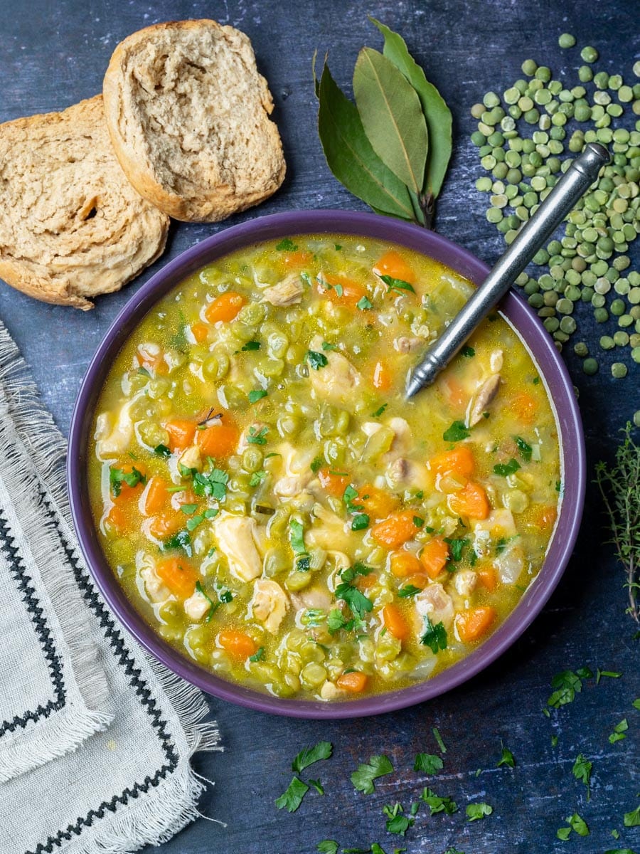 chicken split pea soup with bread on the side