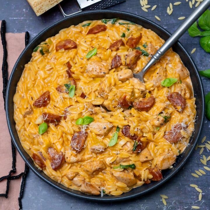 a bowl of pasta with sausage