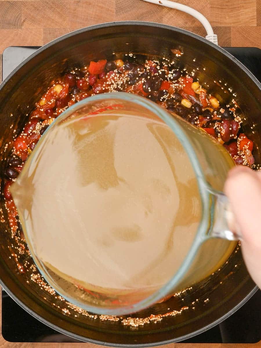 adding stock to a Mexican dish