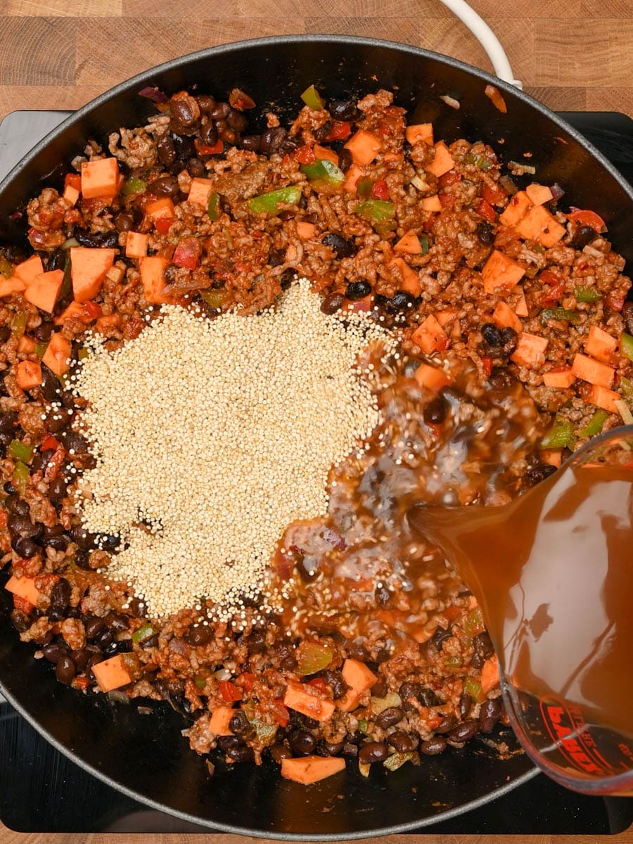 Adding in uncooked quinoa and beef stock