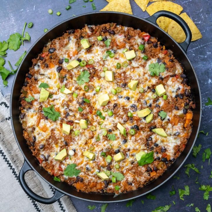 A photo of a Mexican beef skillet with vegetables and cheese