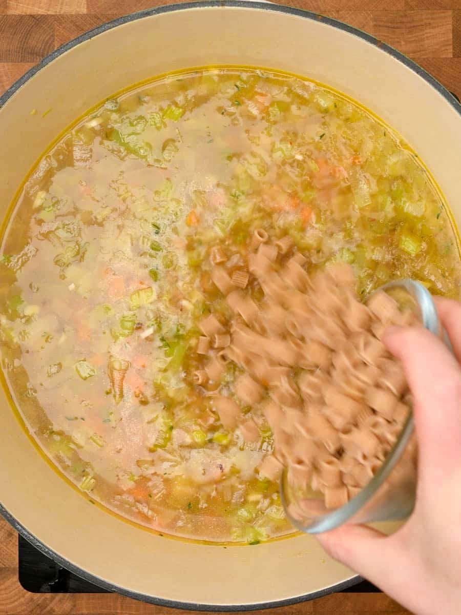 adding pasta to an American dish