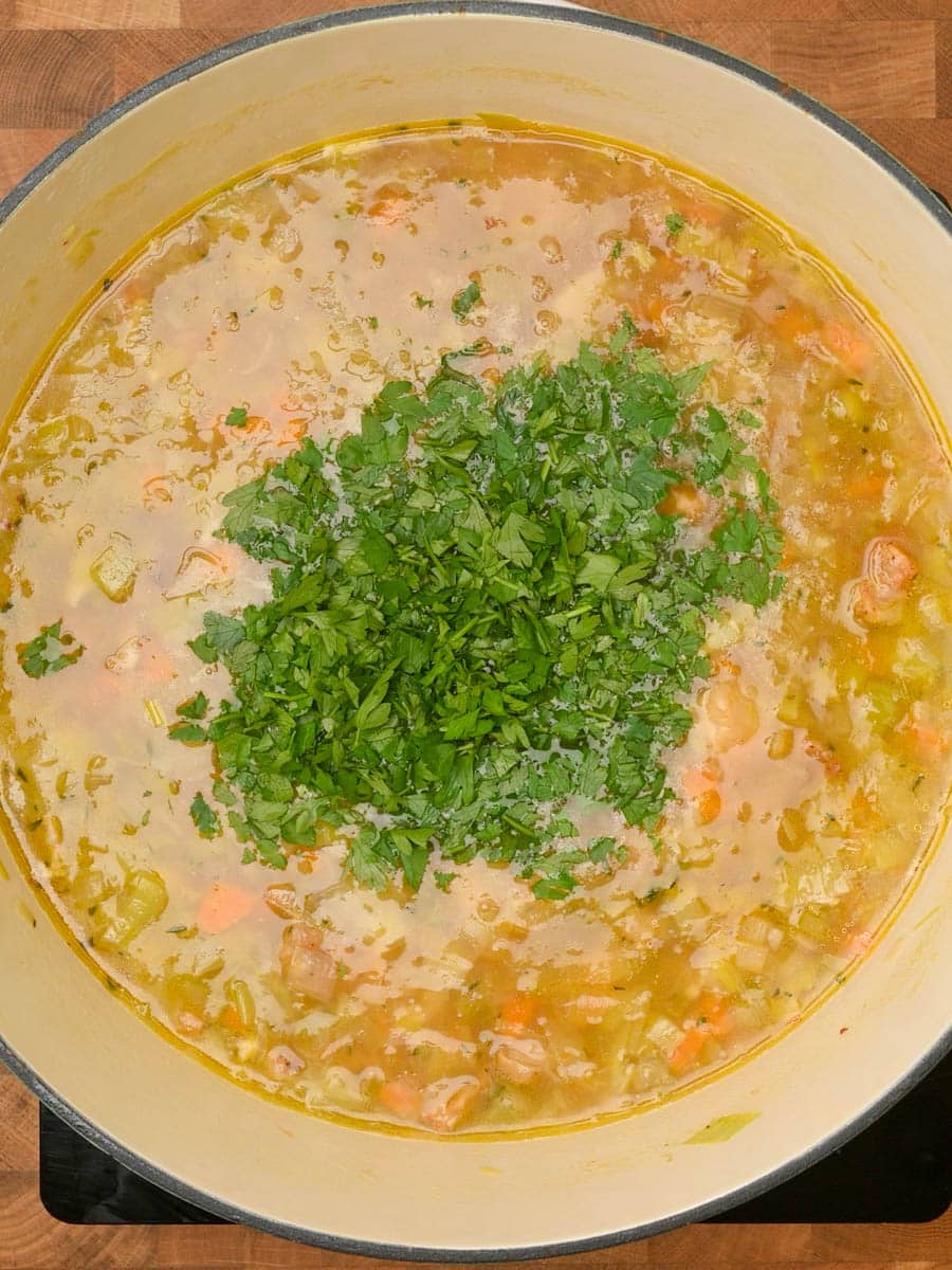 adding parsley to an American dish