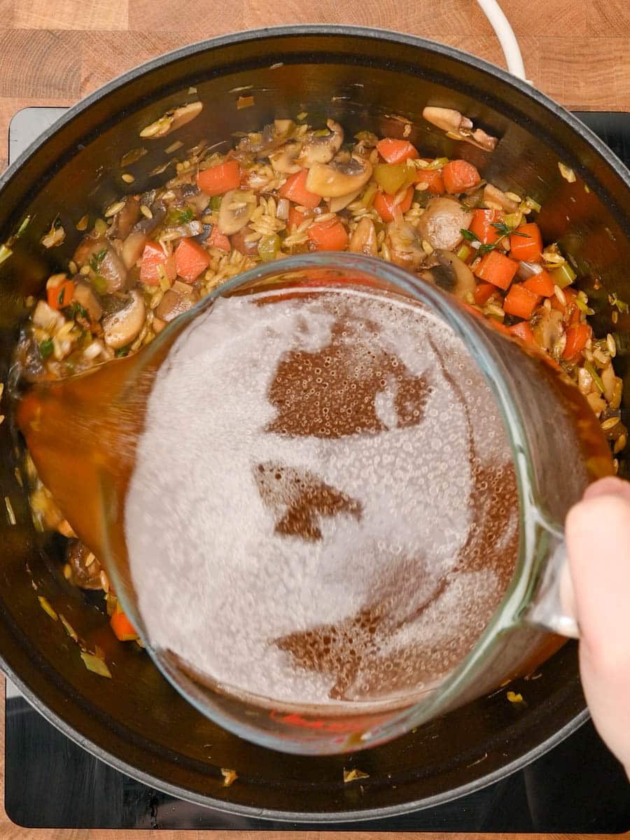 adding stock to an American dish