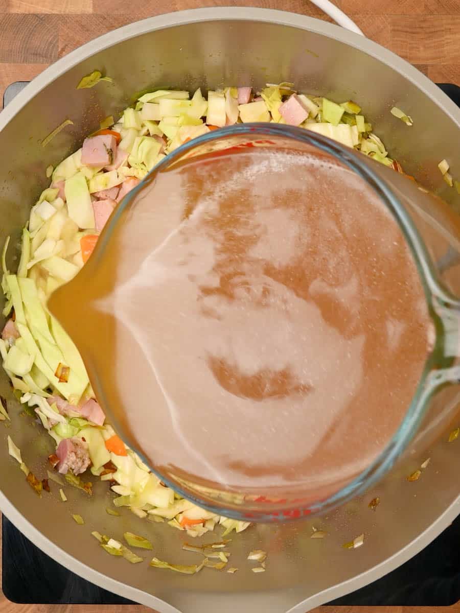 adding stock to an American dish