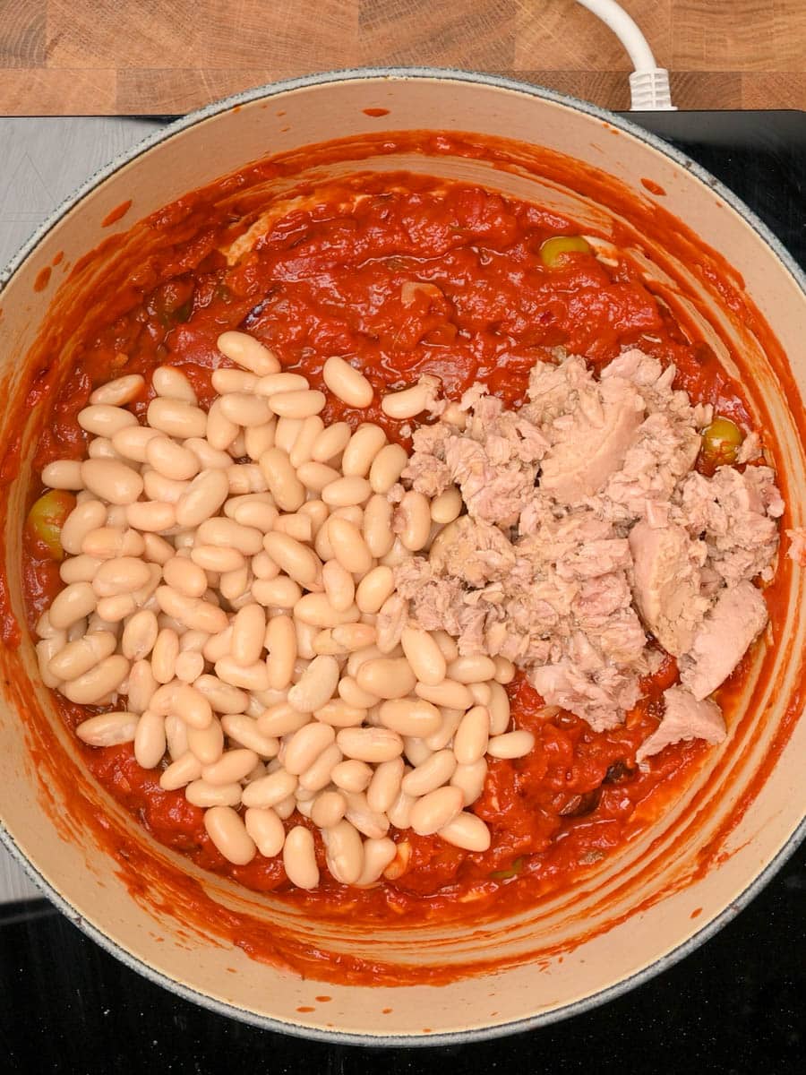 adding beans to an Italian dish
