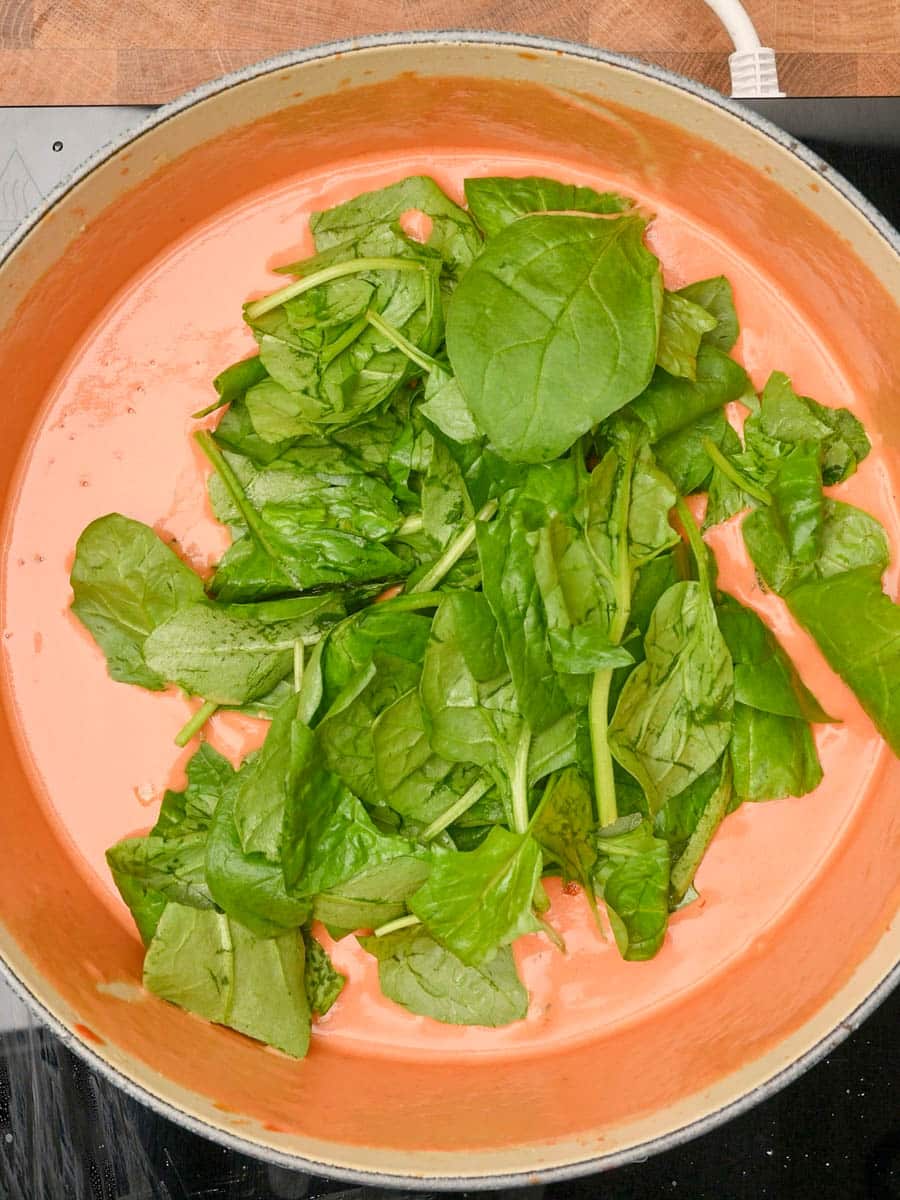 adding spinach to a British dish
