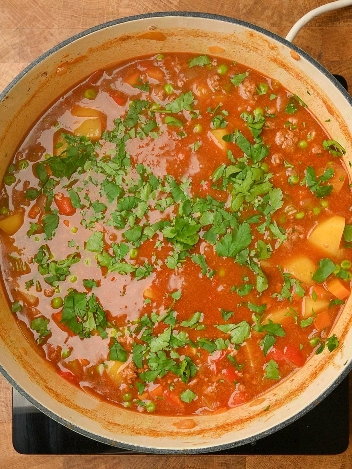 adding parsley to a ground beef stew