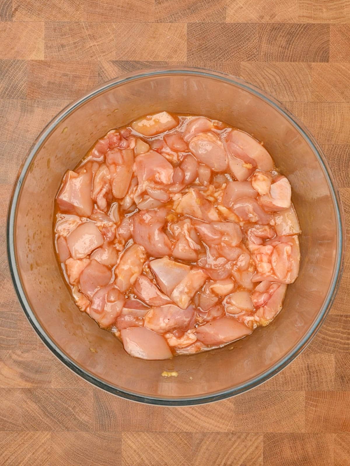 marinated pieces of chicken in a bowl
