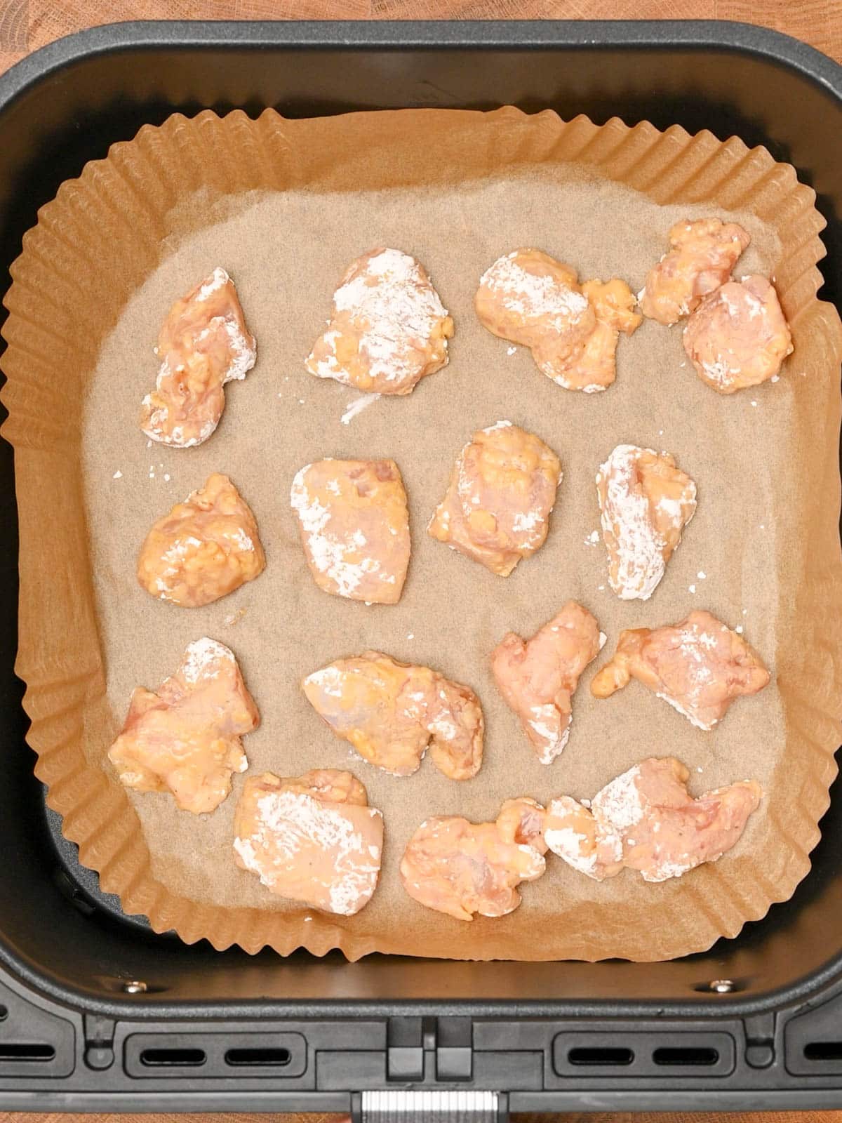 pieces of bang bang chicken coated in cornstarch