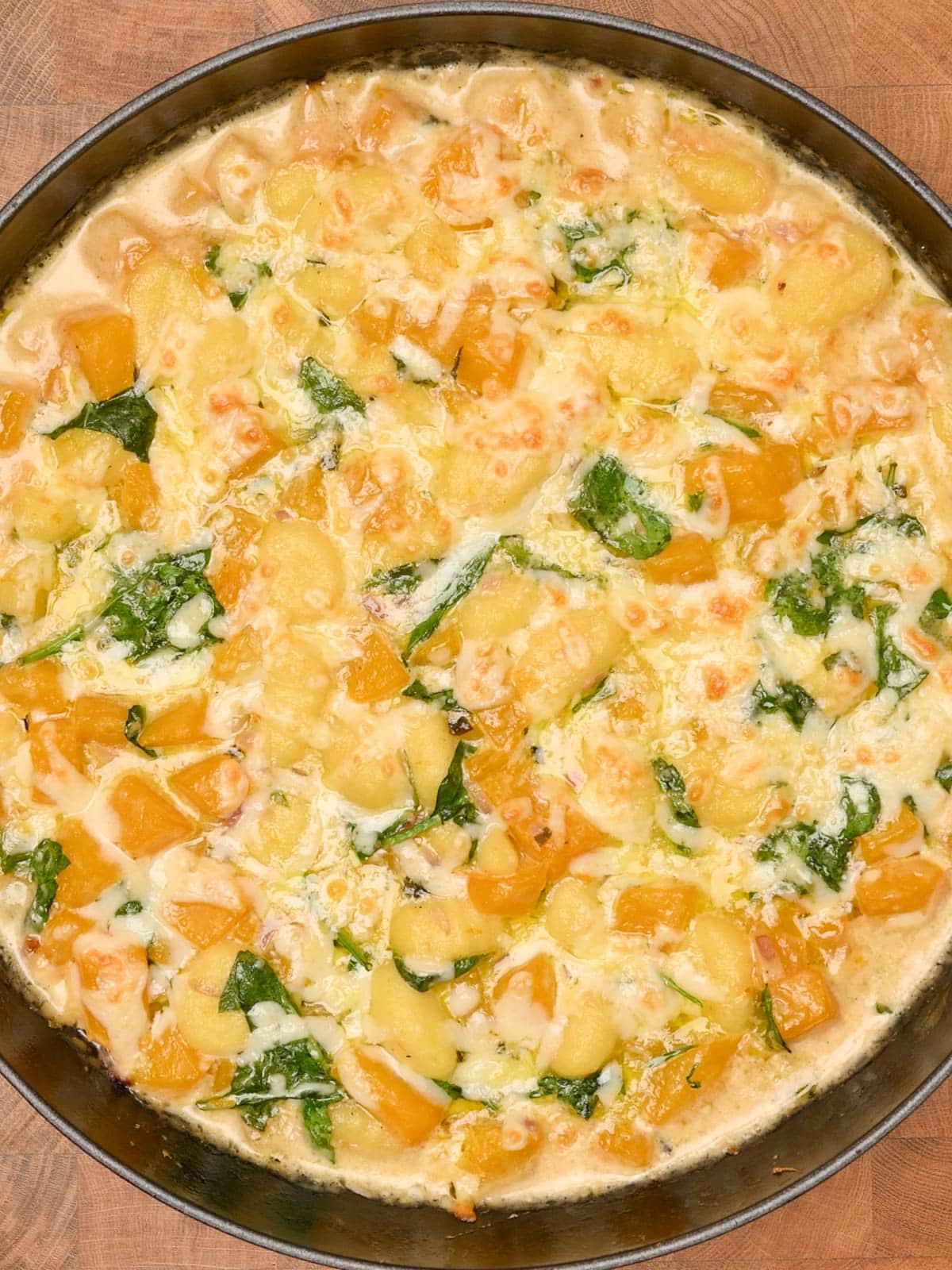 melted cheese over the pasta bake