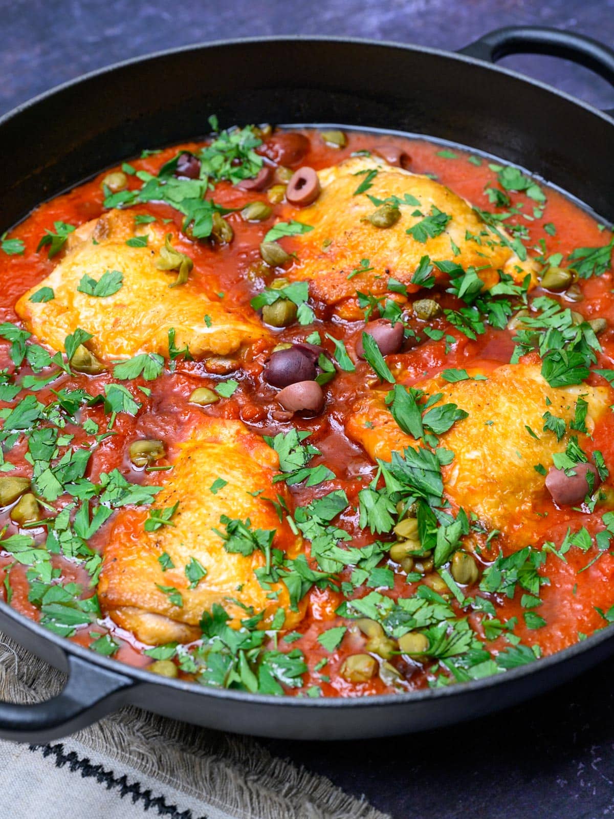 close up photo of chicken puttanesca
