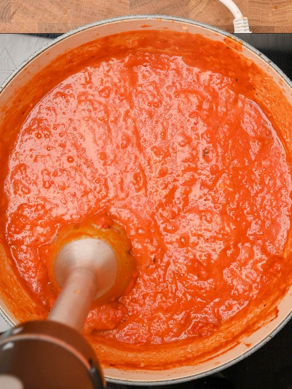 Blending the soup until creamy.