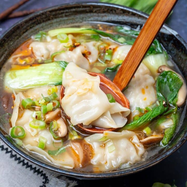 a bowl of soup with bok choy